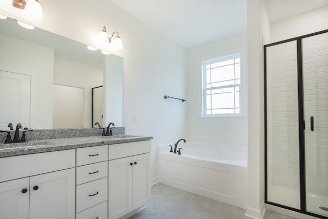 bathroom featuring vanity and separate shower and tub