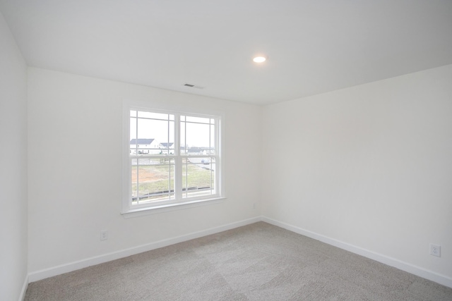 empty room with carpet flooring