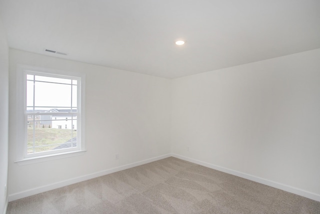 view of carpeted spare room