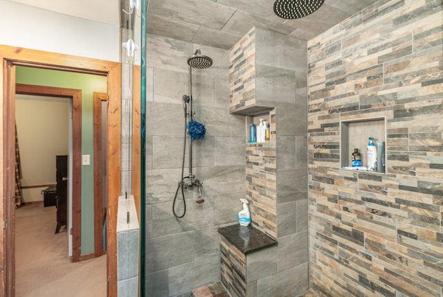 bathroom featuring tiled shower