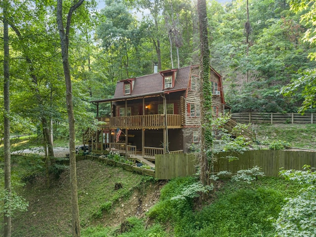 rear view of house with a deck