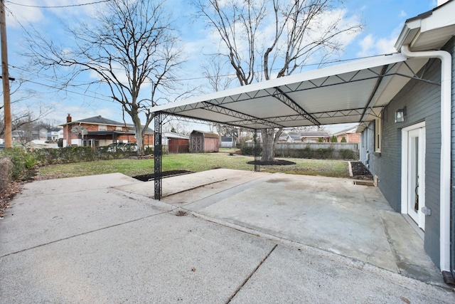 view of patio / terrace with a carport