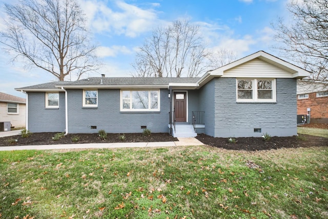 ranch-style home with a front lawn and cooling unit