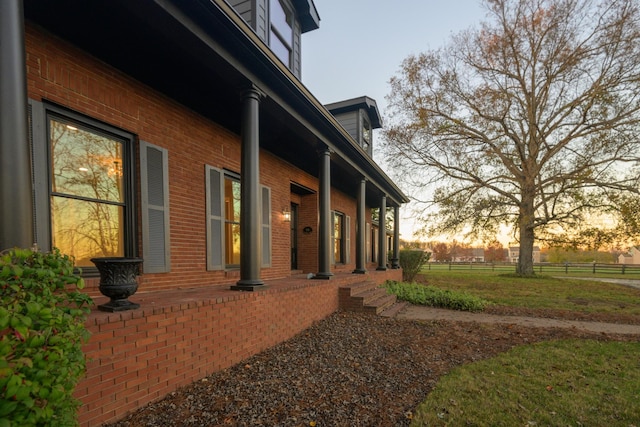 view of property exterior at dusk