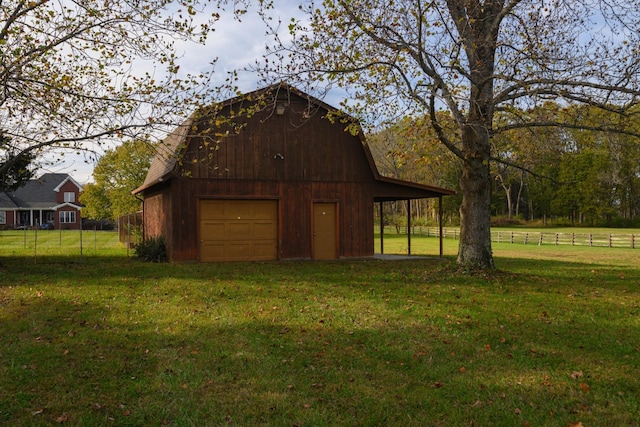 view of outdoor structure featuring a lawn