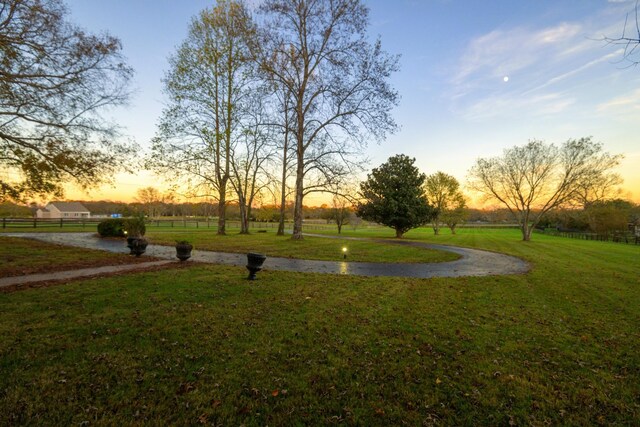 surrounding community featuring a lawn