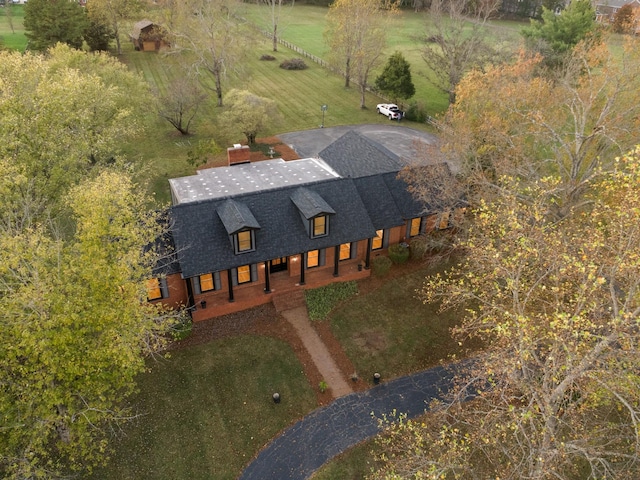 birds eye view of property with a rural view