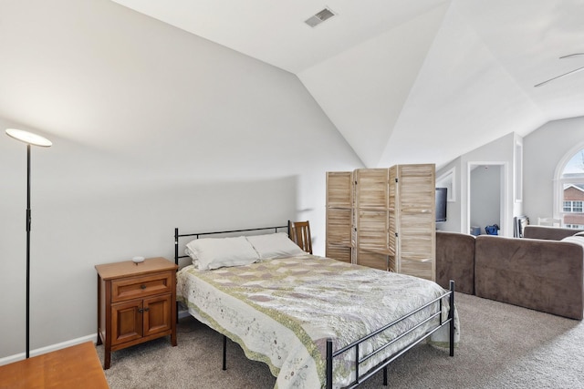 bedroom with light carpet and vaulted ceiling