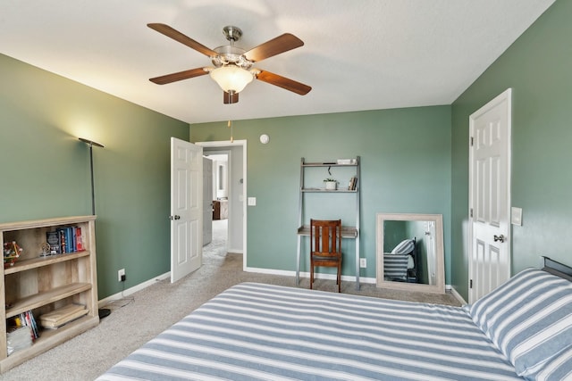 bedroom featuring ceiling fan and light colored carpet