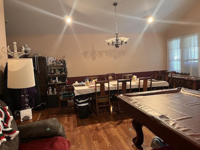 playroom featuring a chandelier, dark hardwood / wood-style floors, and pool table