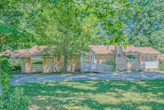 view of front of home with a front lawn