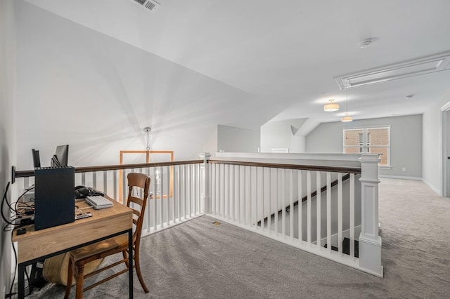 home office featuring carpet and lofted ceiling