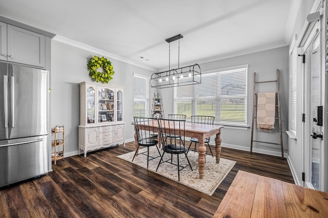 dining space with dark wood-type flooring and ornamental molding