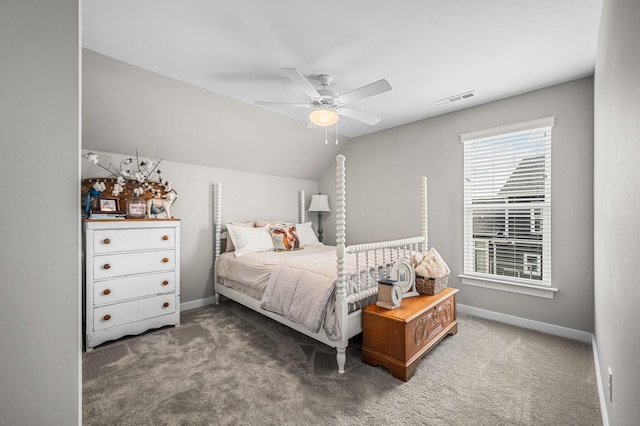 carpeted bedroom with ceiling fan and lofted ceiling