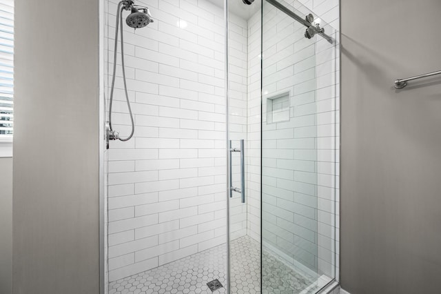 bathroom featuring walk in shower