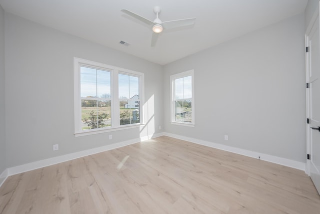 unfurnished room with light hardwood / wood-style floors and ceiling fan