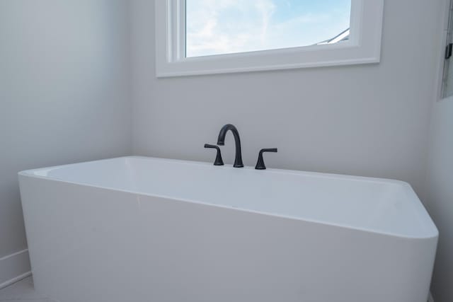 bathroom featuring a bathing tub