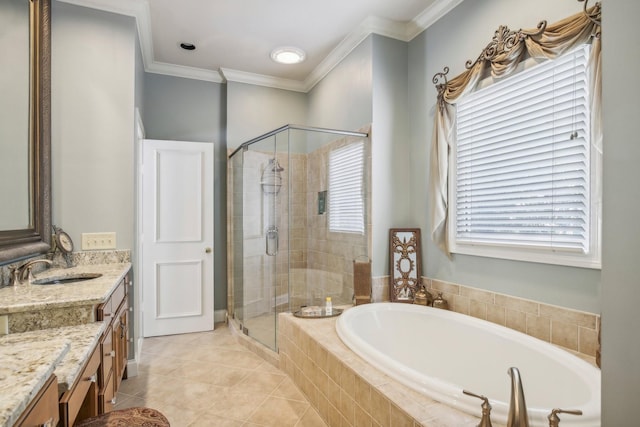 bathroom featuring tile patterned floors, vanity, crown molding, and independent shower and bath