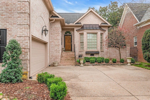 property entrance with a garage