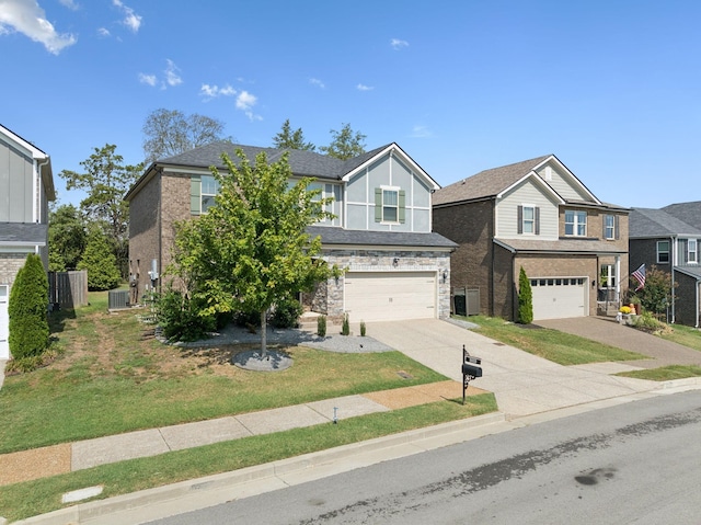 view of front of property featuring a front lawn, central AC unit, and a garage