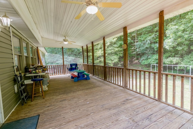 wooden deck with ceiling fan