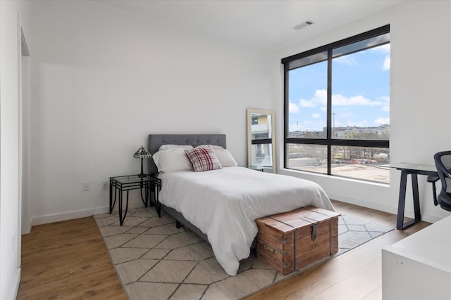 bedroom featuring light hardwood / wood-style floors