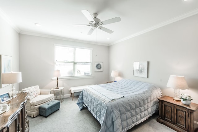 bedroom featuring light carpet, ceiling fan, and crown molding