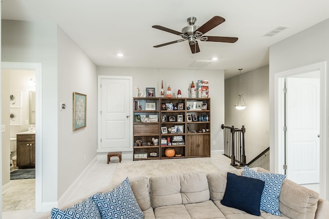 sitting room with ceiling fan