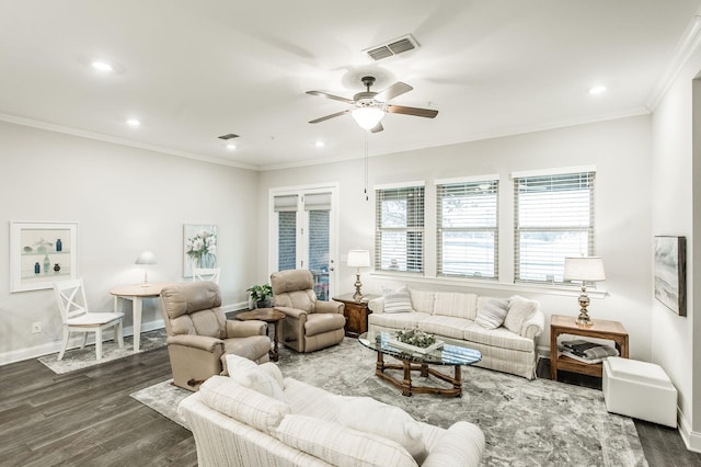 living room with dark hardwood / wood-style flooring, ceiling fan, and crown molding