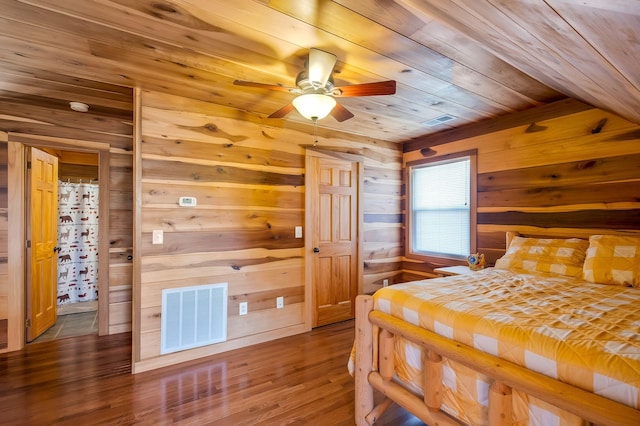 bedroom with hardwood / wood-style floors, ceiling fan, and wood ceiling