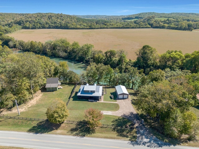 bird's eye view featuring a rural view and a water view