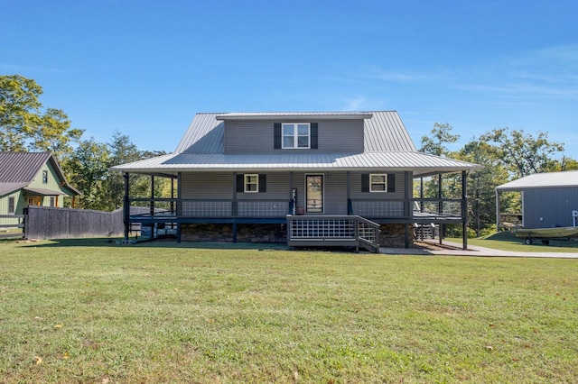 country-style home with a porch and a front yard