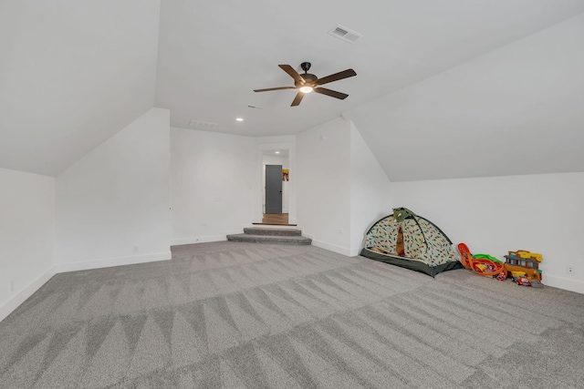 bonus room featuring carpet, vaulted ceiling, and ceiling fan