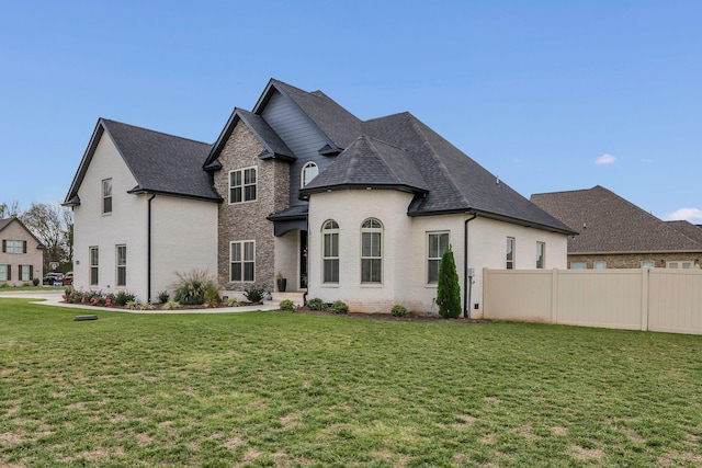 view of front of home with a front yard