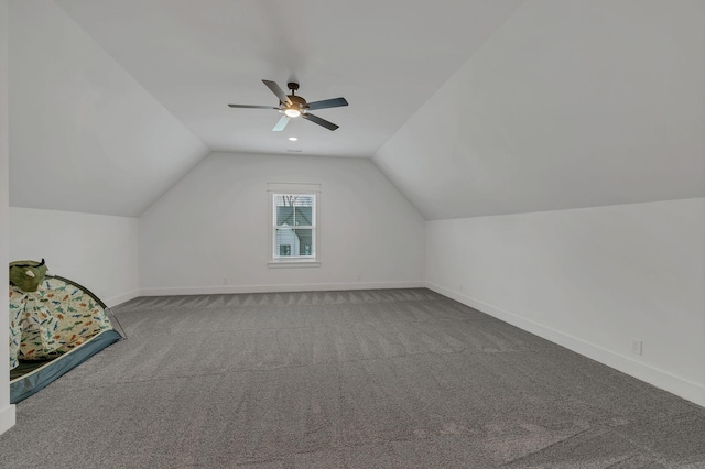 bonus room with carpet flooring, ceiling fan, and vaulted ceiling