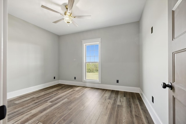 unfurnished room with ceiling fan and hardwood / wood-style floors