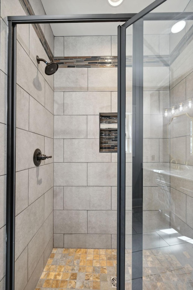 bathroom featuring an enclosed shower