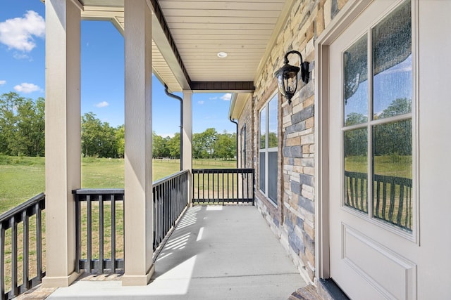 balcony featuring a porch