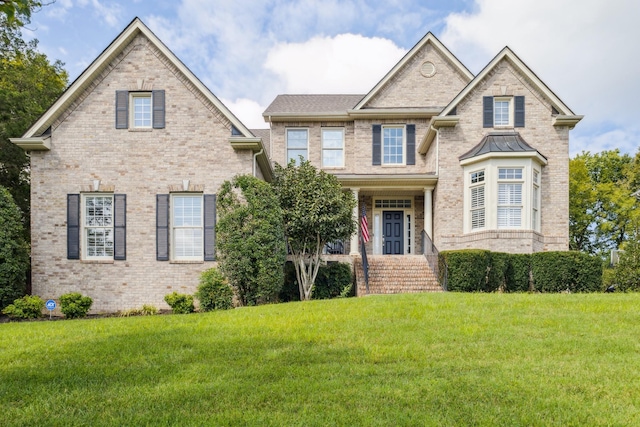 view of front facade with a front yard