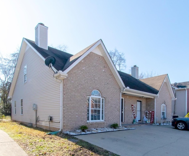 view of home's exterior with a patio area