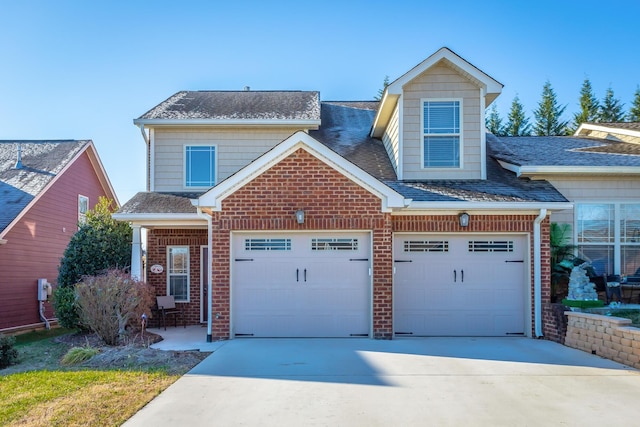 view of front of home with a garage