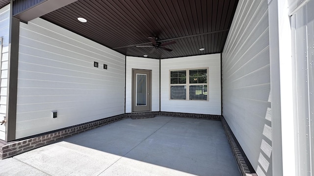 view of patio featuring ceiling fan