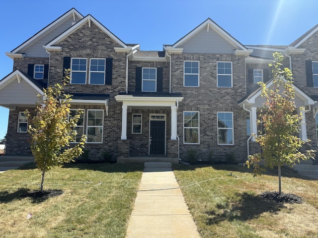 view of front of house featuring a front lawn