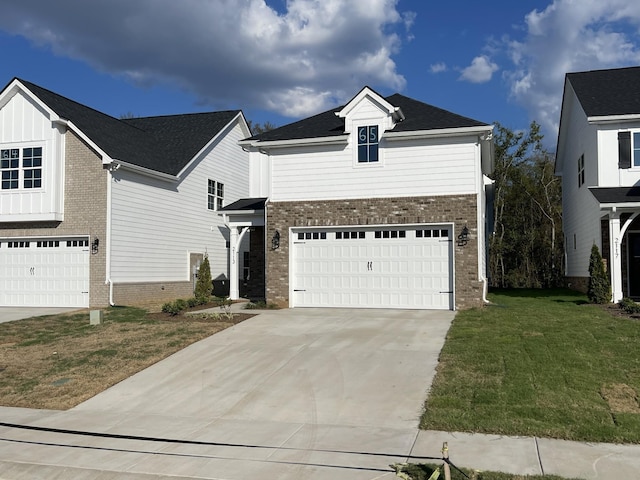 view of front facade featuring a garage and a front lawn