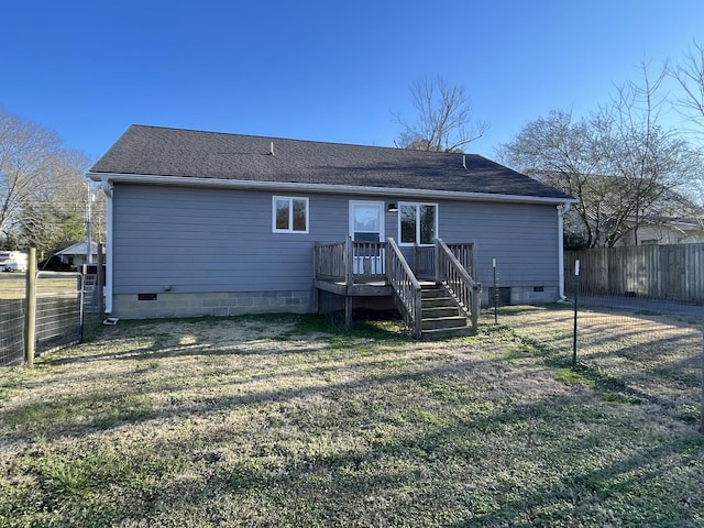 back of house featuring a yard