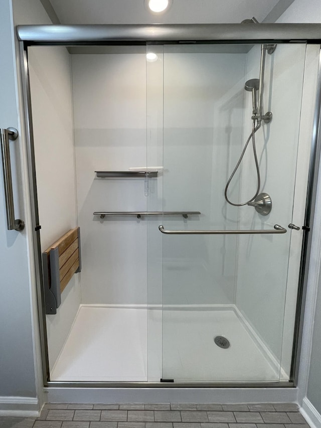 bathroom featuring an enclosed shower