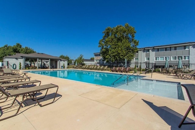 view of swimming pool featuring a patio