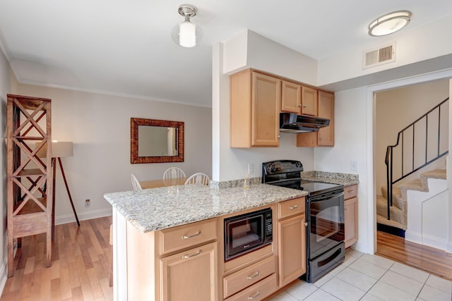 kitchen featuring light stone countertops, kitchen peninsula, crown molding, light brown cabinetry, and black appliances