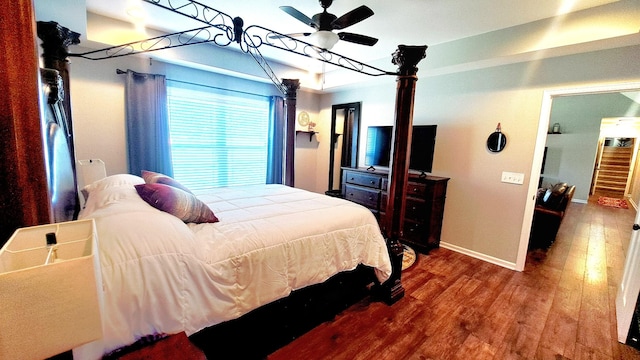 bedroom featuring ceiling fan and wood-type flooring