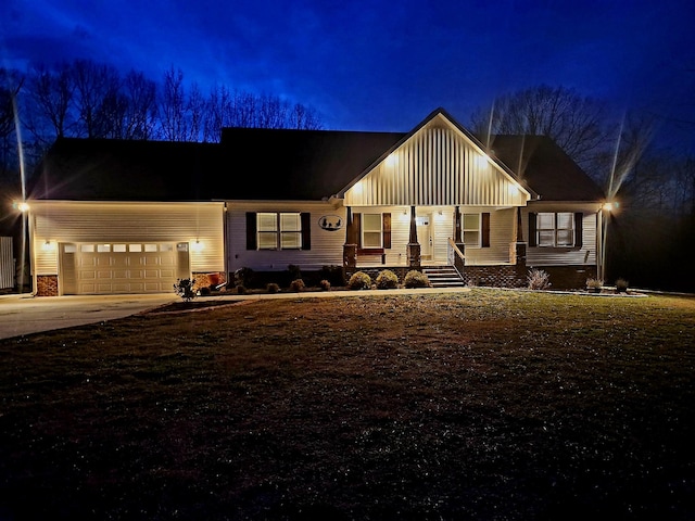 view of front of property featuring a garage and covered porch